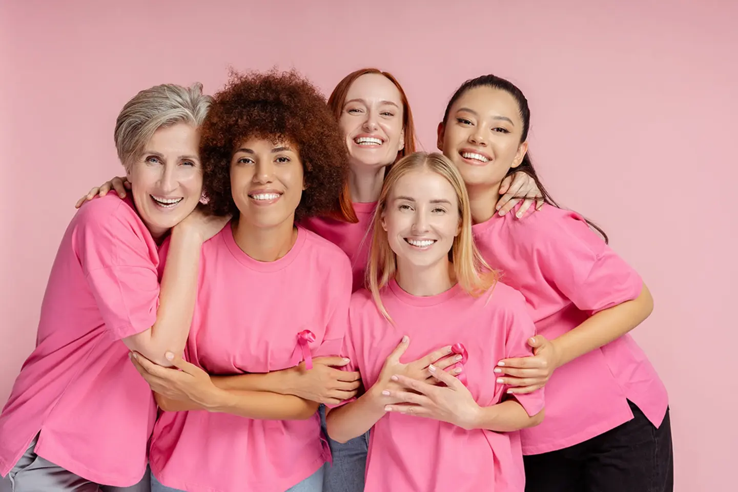 Group of women in Pink T shirts supporting breast cancer